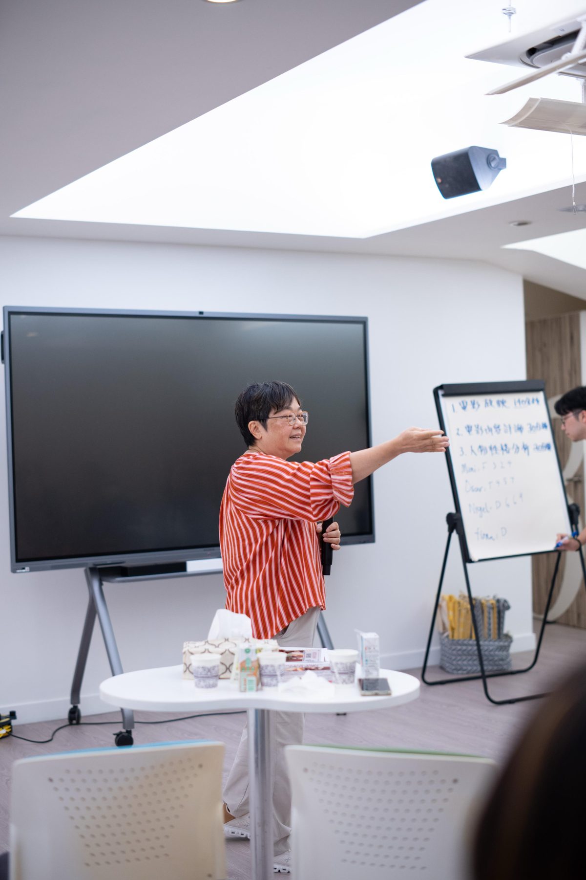 Facilitator guiding a workshop activity